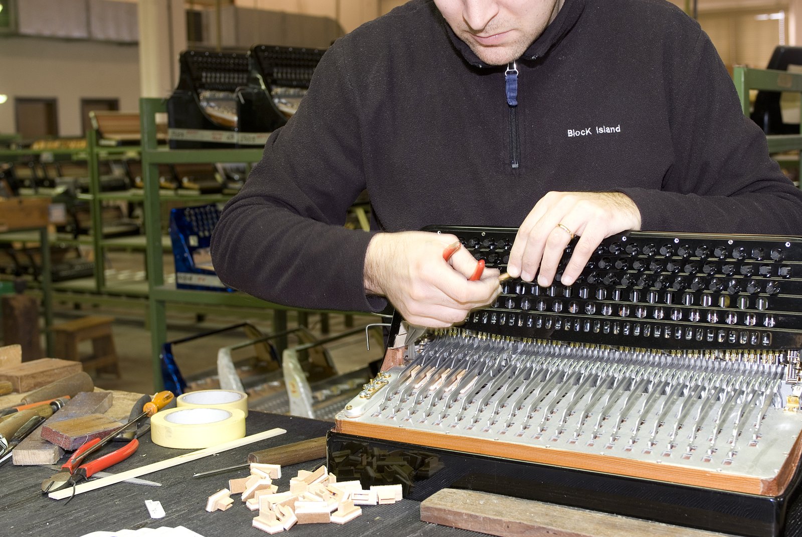 Assembling the bass action at the Bugari workshop